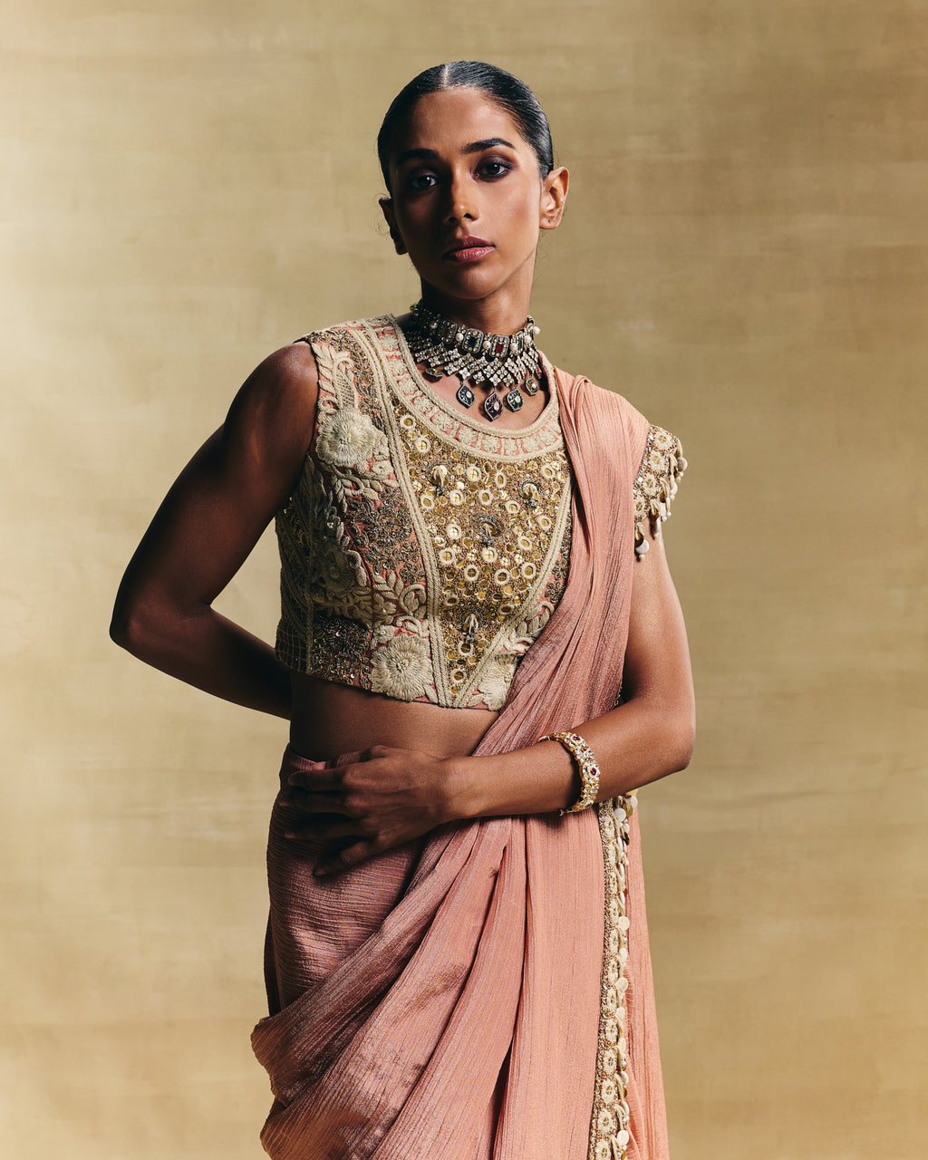 Peach cropped blouse with stitched saree