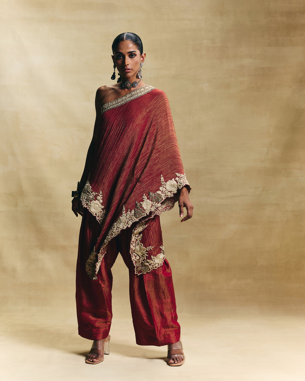 Red one shoulder top with farshi pants