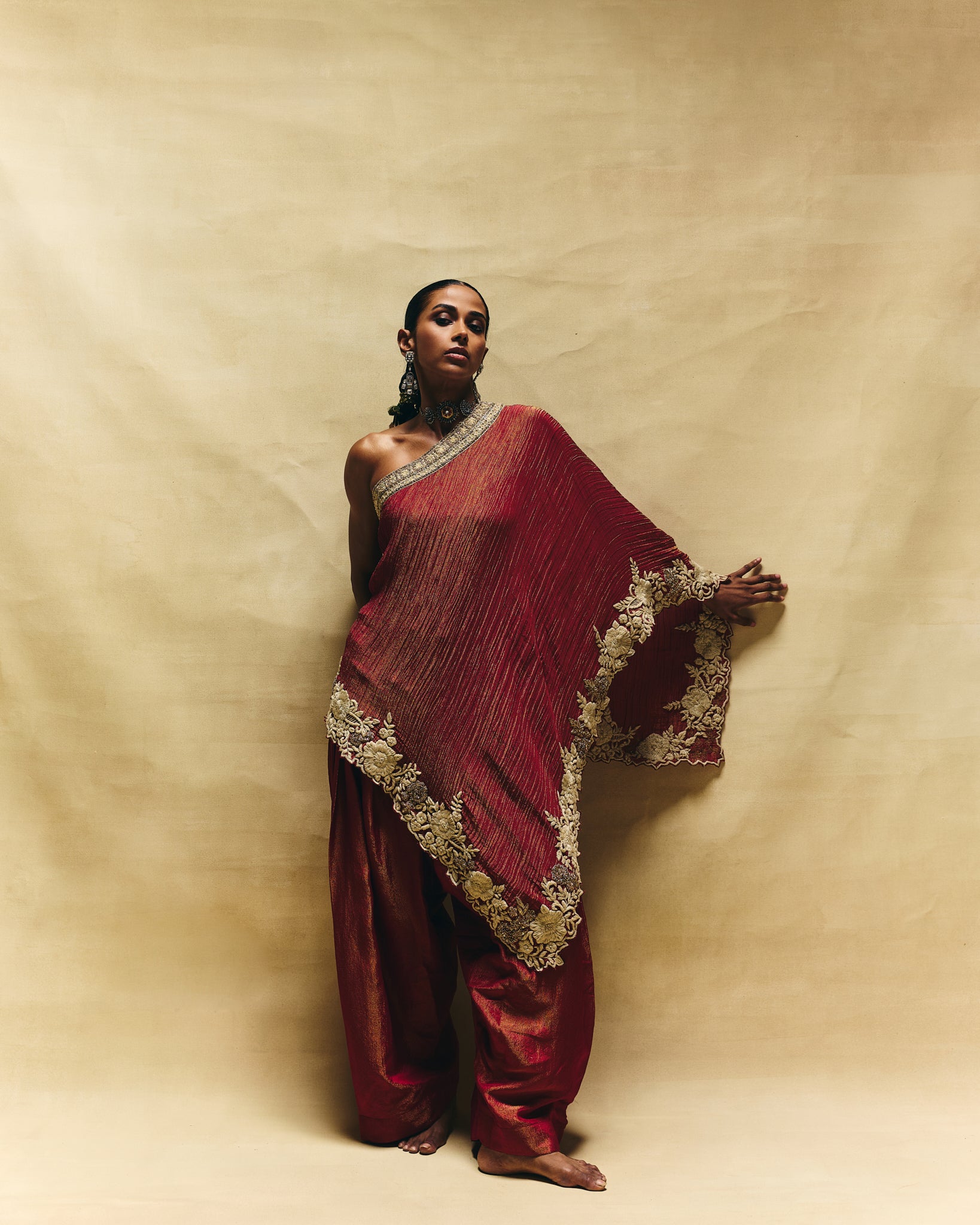 Red one shoulder top with farshi pants