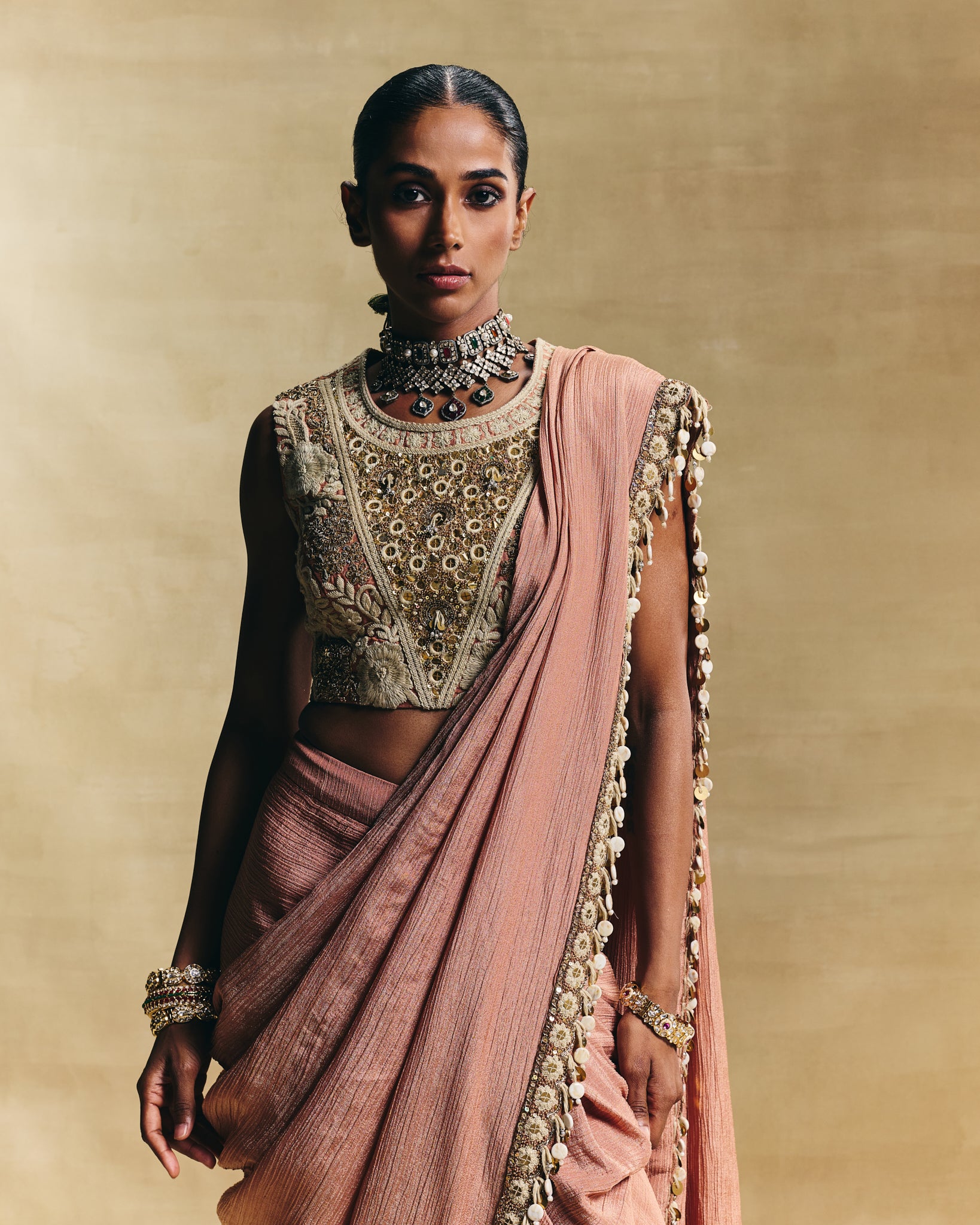 Peach cropped blouse with stitched saree