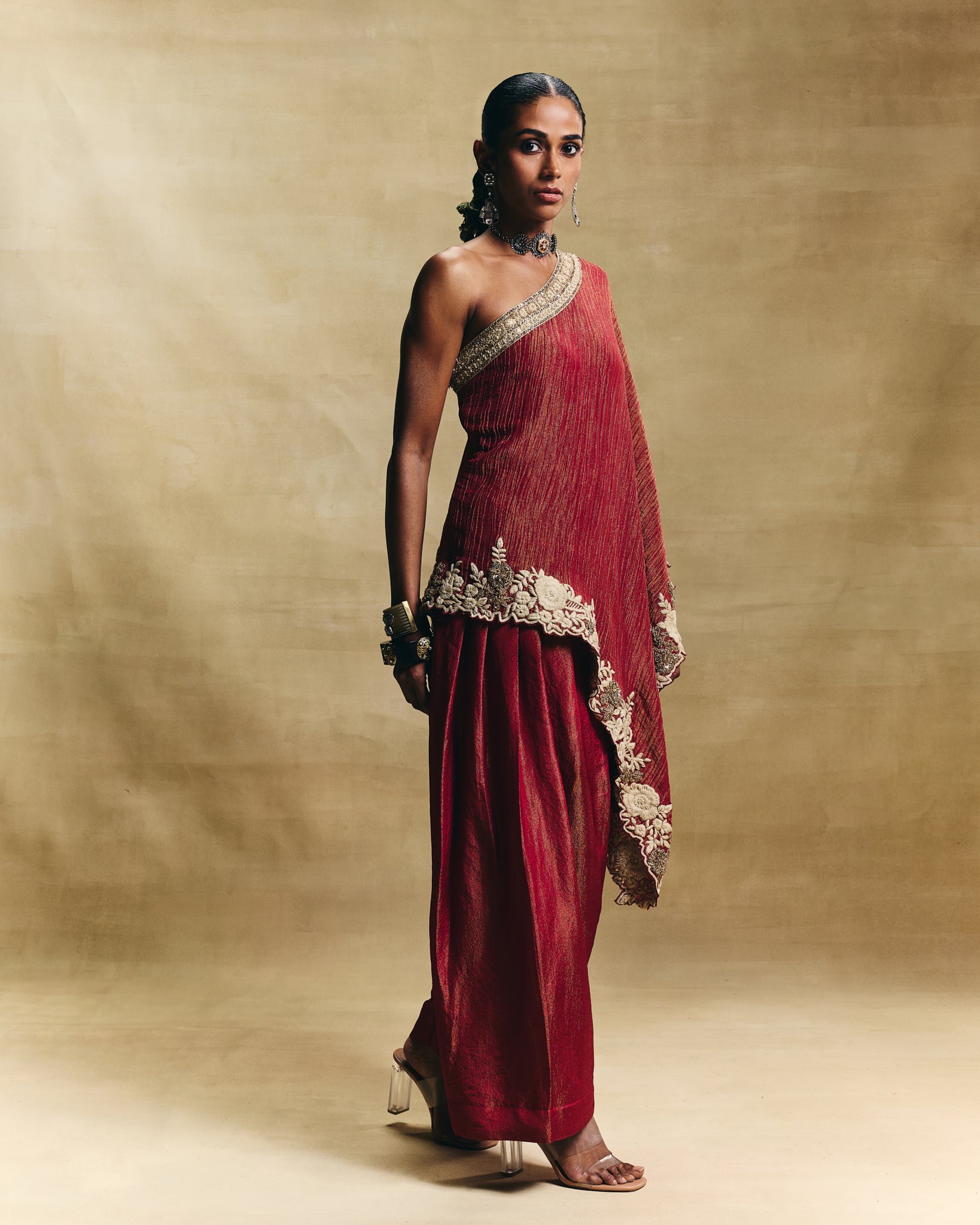 Red one shoulder top with farshi pants