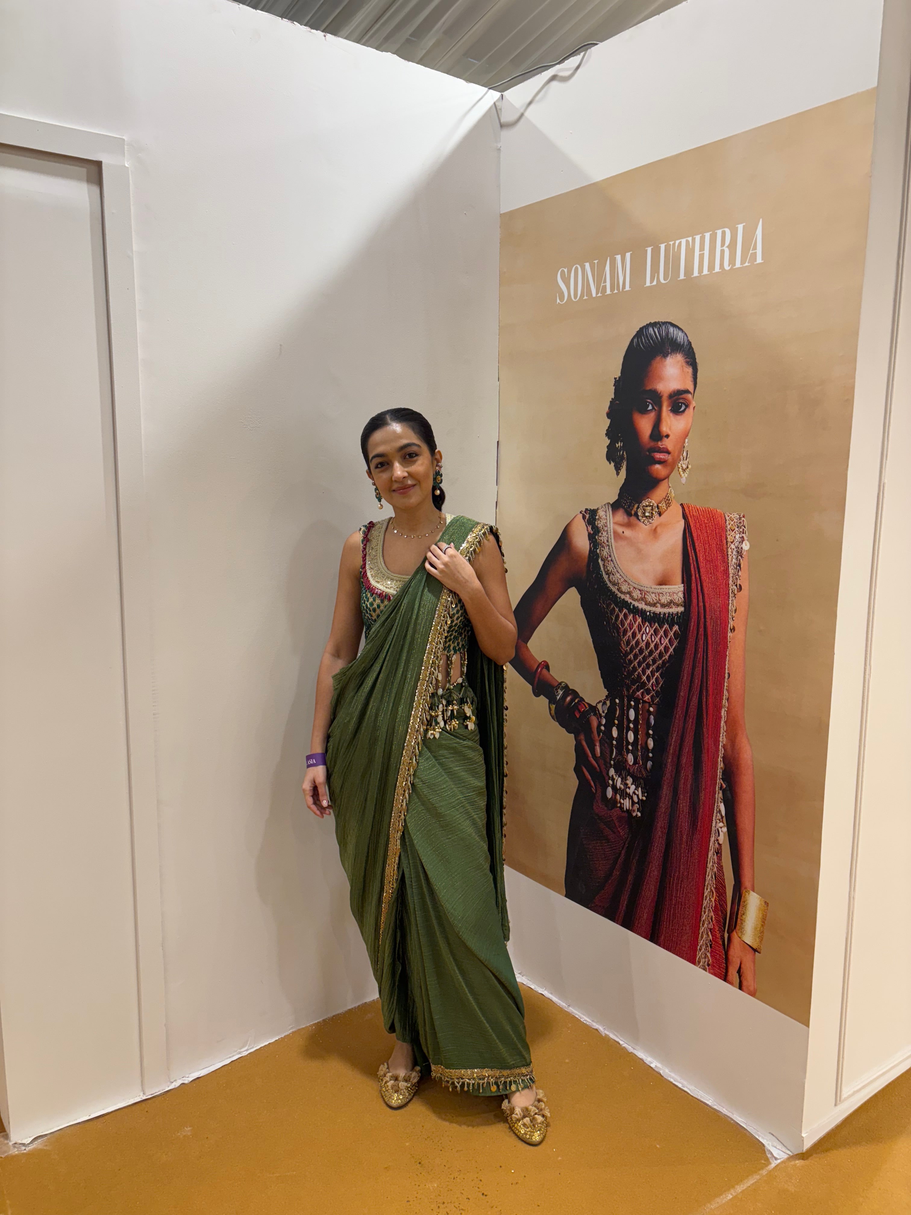 Green lovely blouse with stitched saree