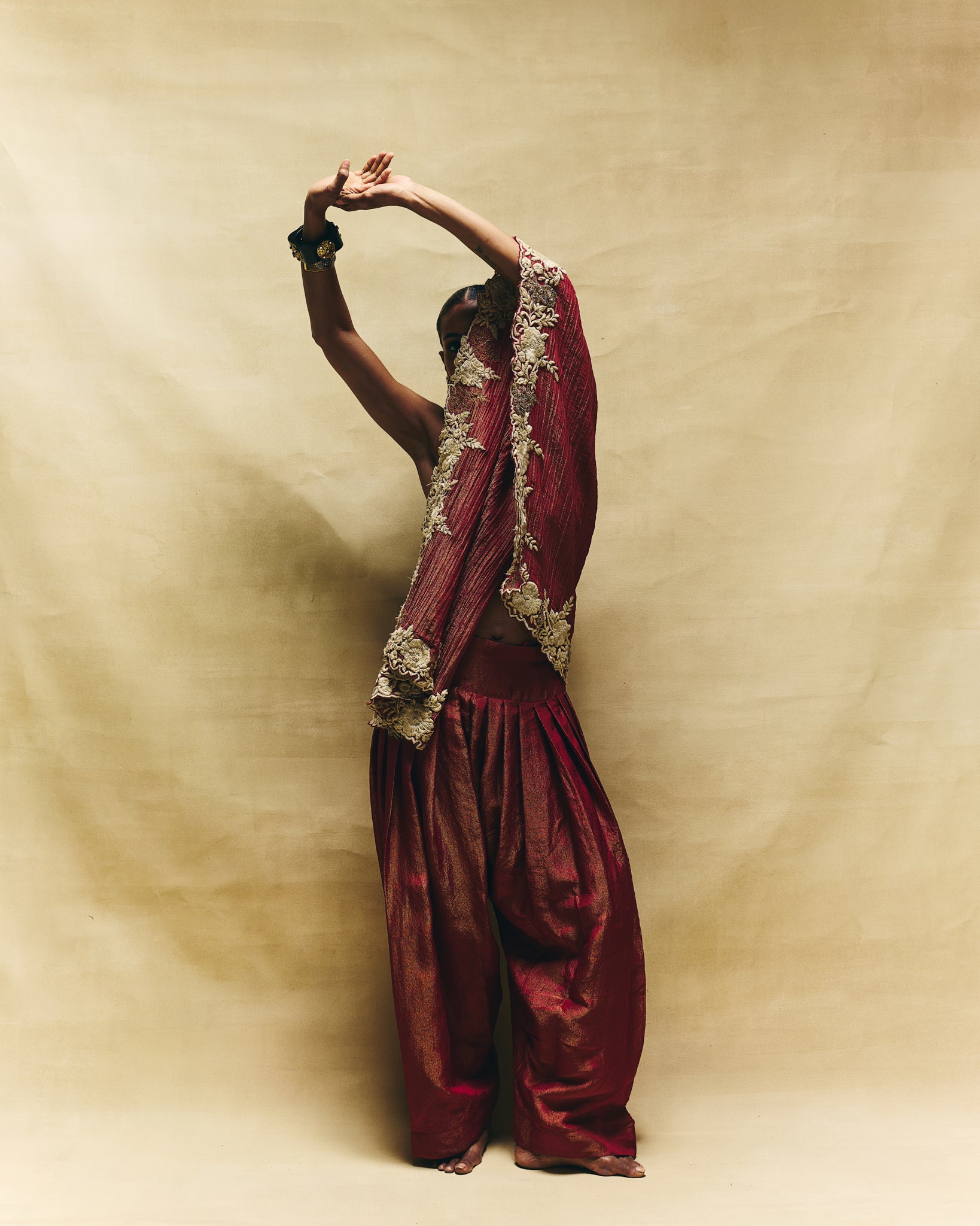 Red one shoulder top with farshi pants