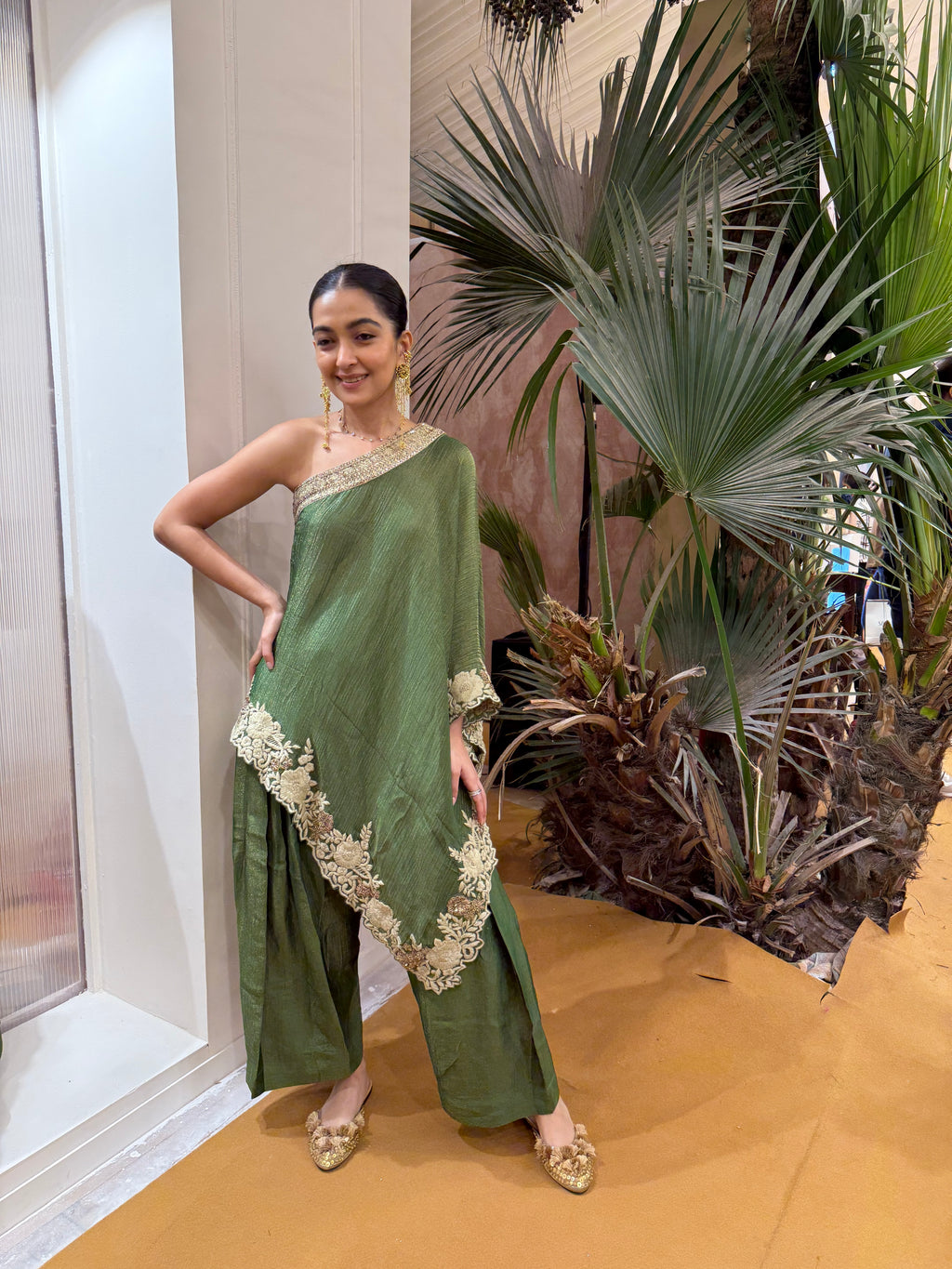 Green one shoulder top with farshi pants