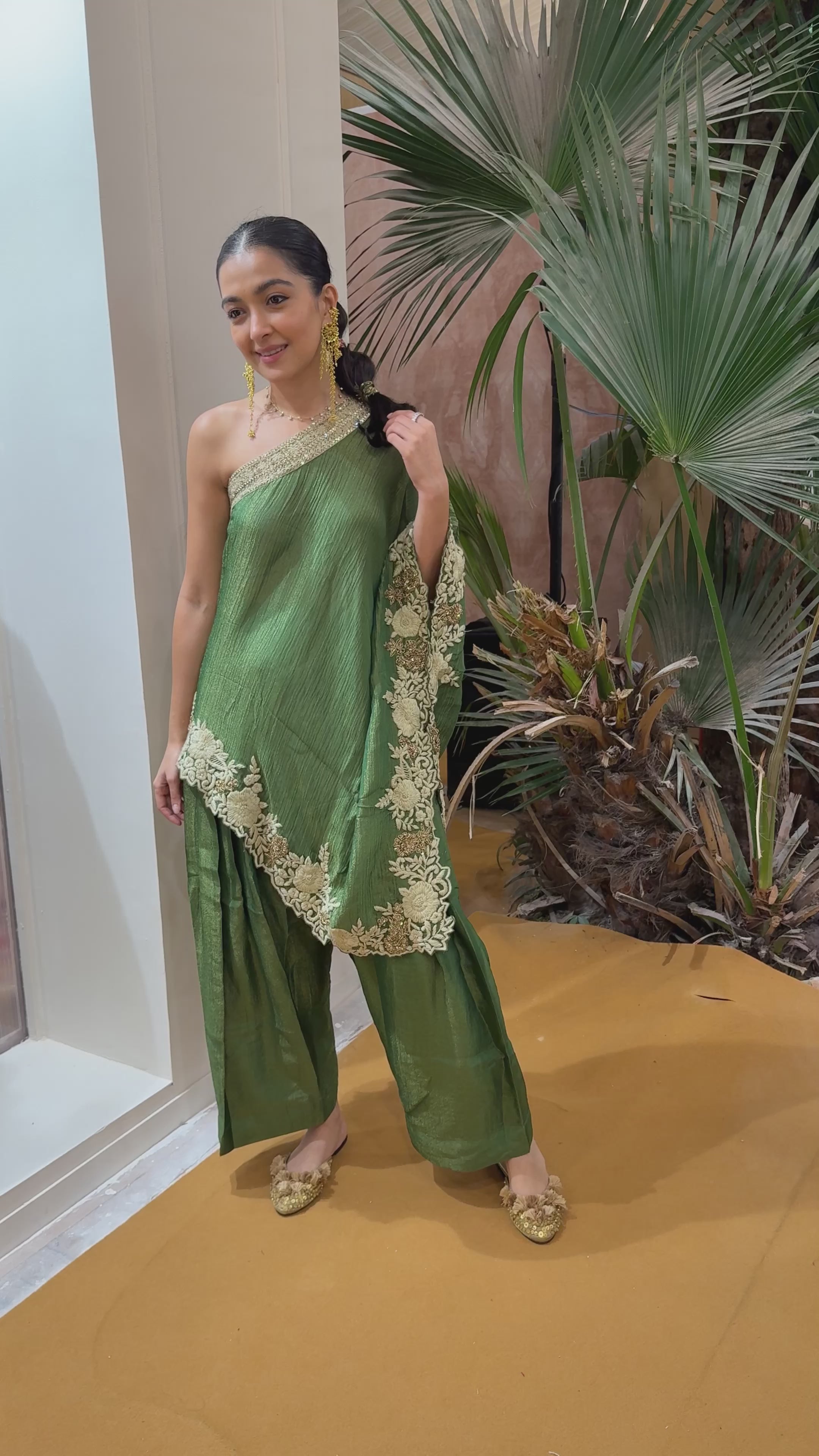 Green one shoulder top with farshi pants